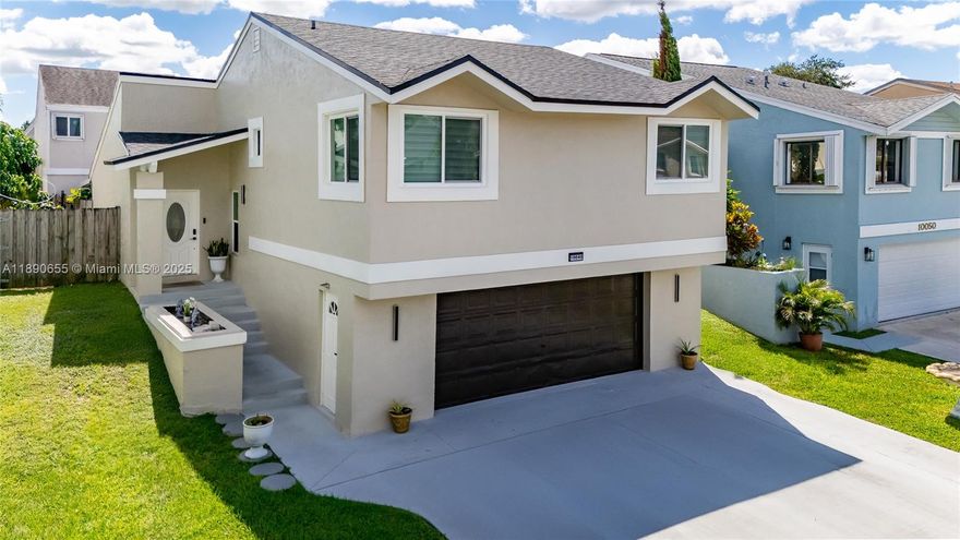Welcome to this elegant home in peaceful Cutler Bay, with a brand-new roof and soaring ceilings that fill every room with light and a sense of spaciousness. Featuring impact windows, 3 bedrooms, 2 bathrooms, and a versatile additional space, this home is perfect for modern living. The garage has been transformed into a private in-law suite with its own bathroom, or a home office/studio ideal for work or visitors. One bedroom is conveniently located on the ground floor. Unwind in your modern jacuzzi after a long day. Nestled in a community with a pool, tennis courts, and scenic lakes, this home is just minutes from Black Point Marina, parks, shopping centers, and the Turnpike, offering easy access across South Florida. Freshly painted and move-in ready, this home is built to last!