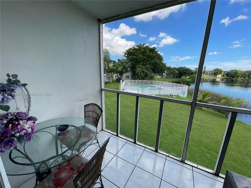 Photo of 5480 NW 11th St #201, Plantation, FL 33313 (MLS # A12010597)