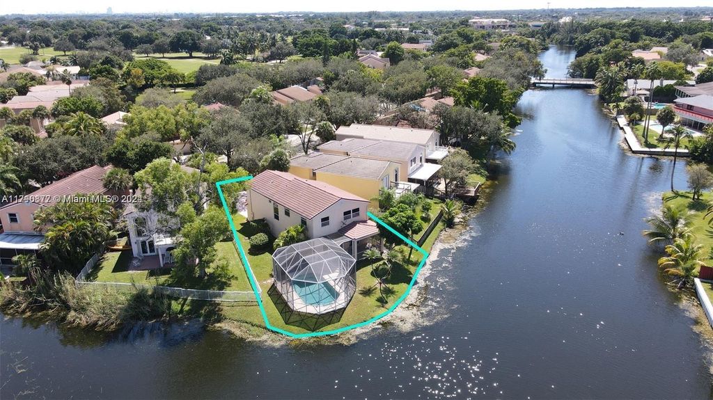 Photo of 9867 Fairway Cove Ln, Plantation, FL 33324 (MLS # A11710877)