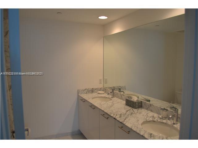 THE PLAZA 901 BRICKELL CO - Residential Lease