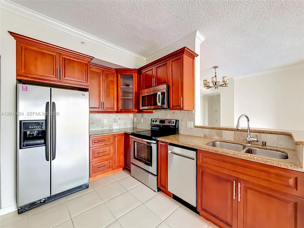Photo of 6968 SW 39th St #F205, Davie, FL 33314 (MLS # A12011624)