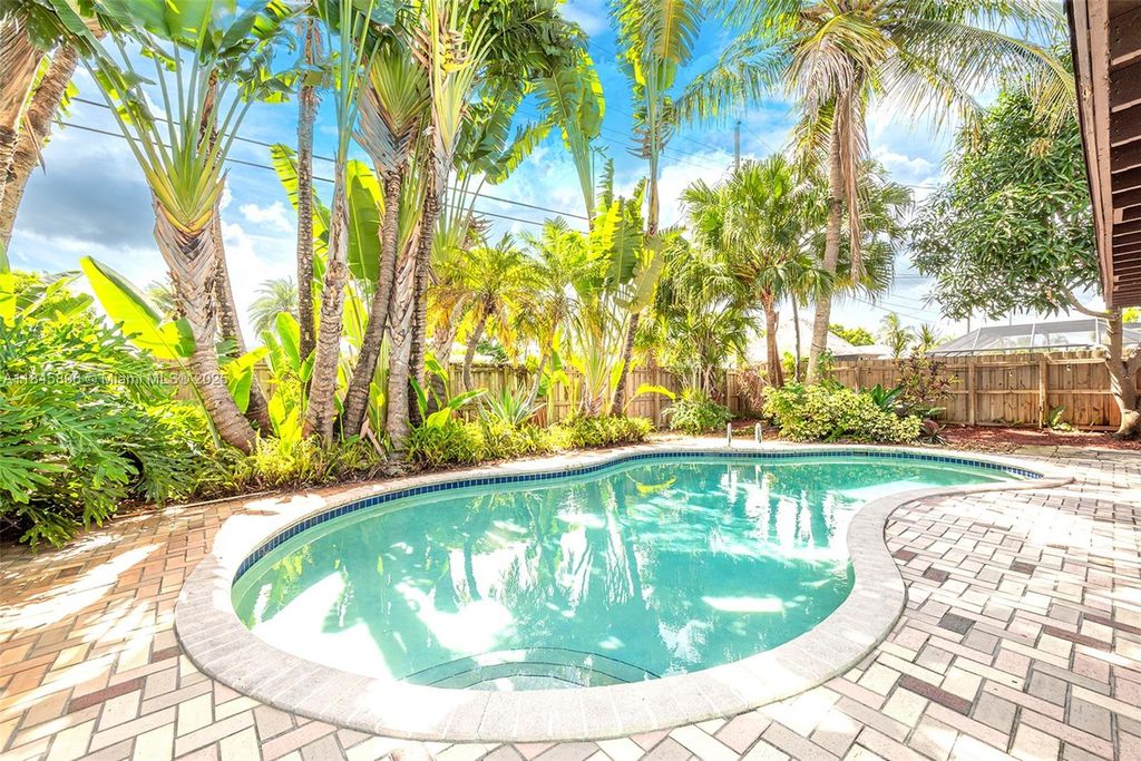 Photo of 4400 NE 13th Ave, Oakland Park, FL 33334 (MLS # A11845806)