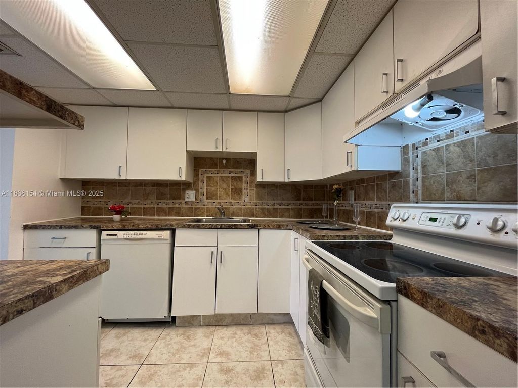 Photo of 4354 NW 9th Ave #12-1C, Deerfield Beach, FL 33064 (MLS # A11838154)