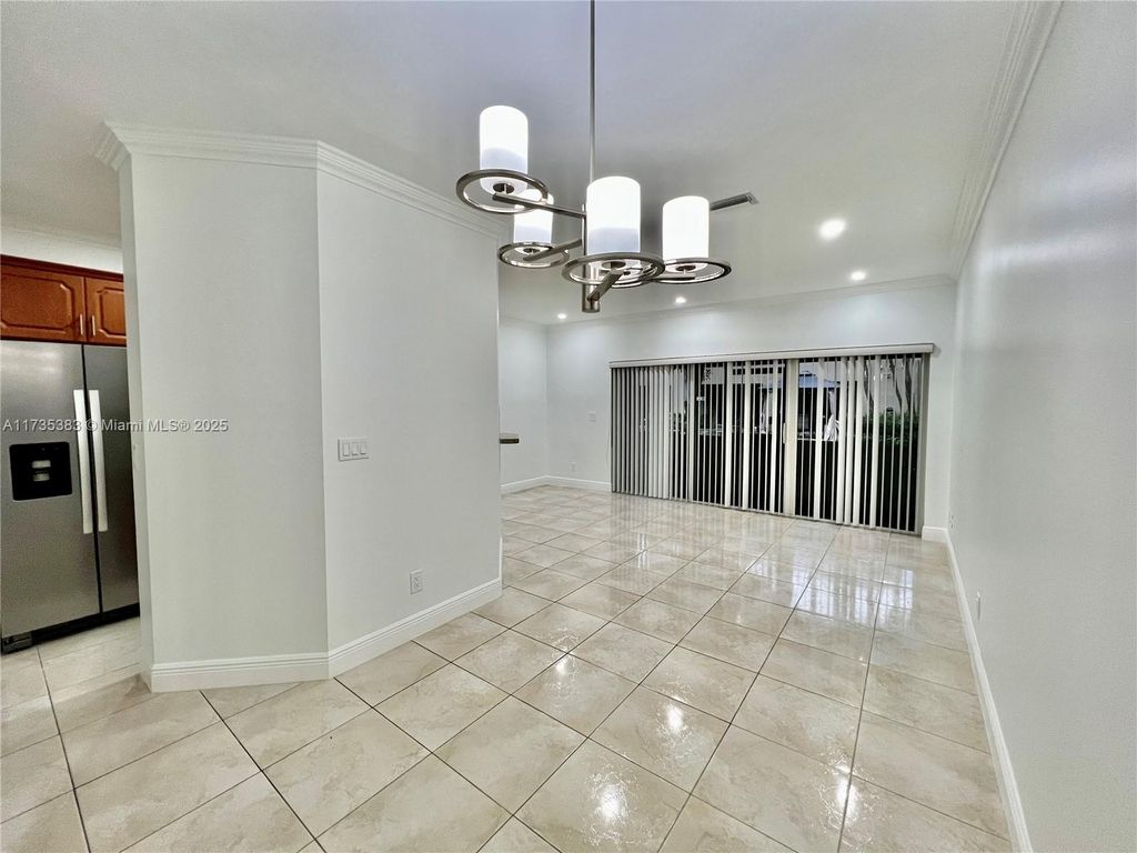 Photo of 391 SW 122nd Ter #391, Pembroke Pines, FL 33025 (MLS # A11735383)