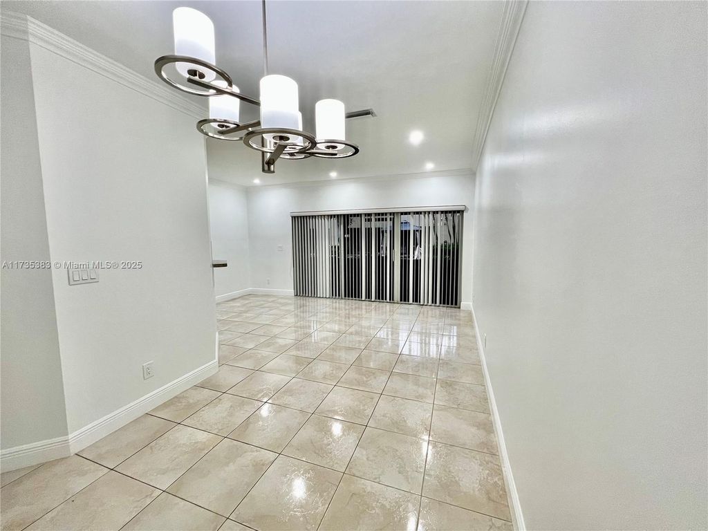 Photo of 391 SW 122nd Ter #391, Pembroke Pines, FL 33025 (MLS # A11735383)