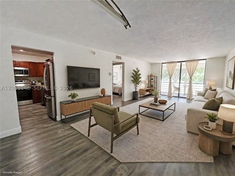 Photo of 1400 Saint Charles Pl #217, Pembroke Pines, FL 33026 (MLS # A12051146)