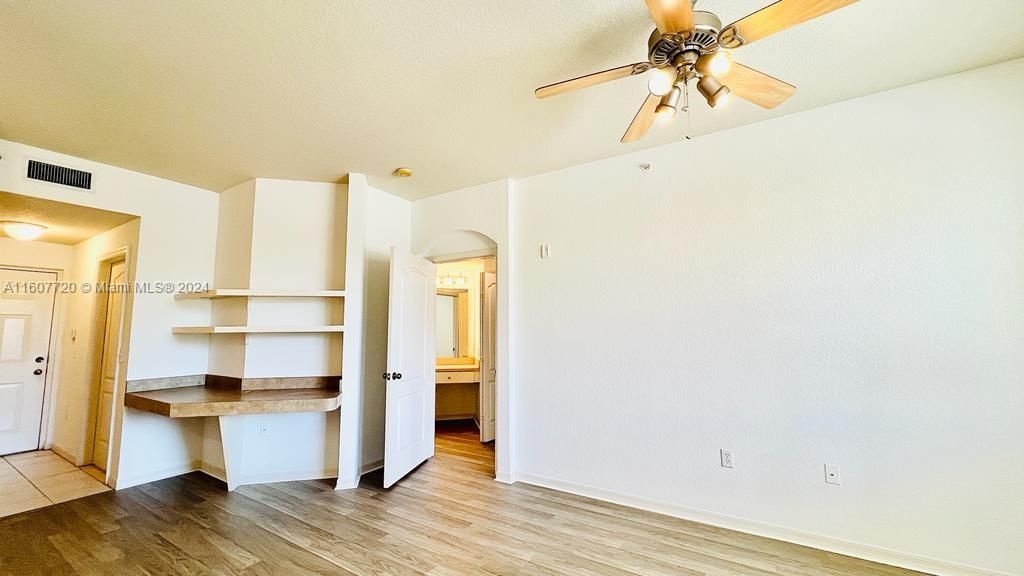 Photo of 11010 Legacy Dr #203, Palm Beach Gardens, FL 33410 (MLS # A11607720)