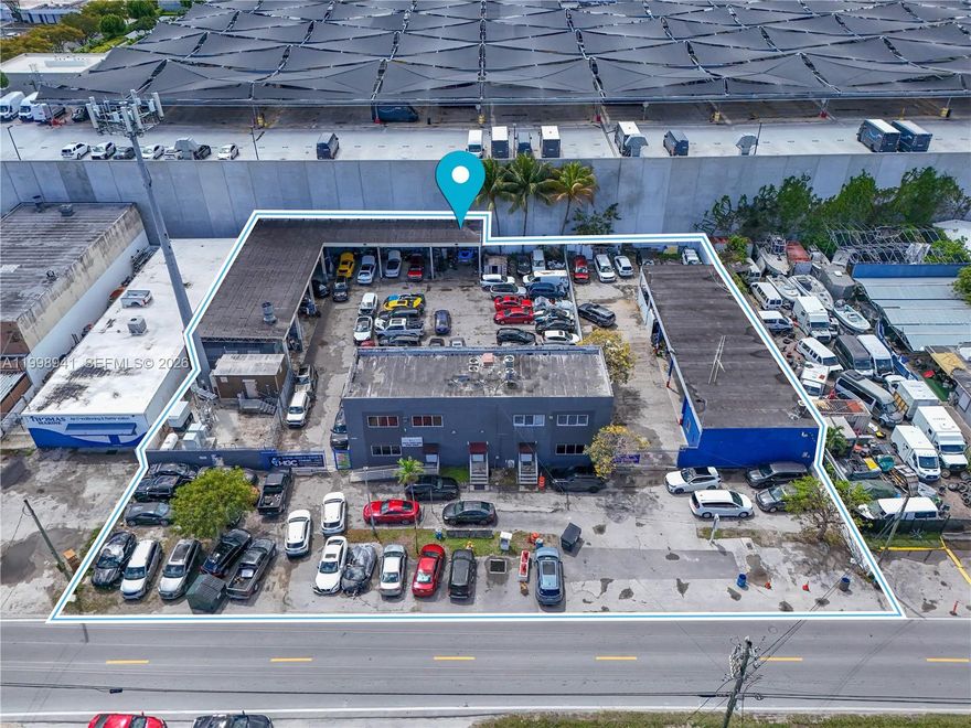 Rare Miami River corridor commercial opportunity on approximately 32,000 SF of land with an existing 12,406 SF building and full-site county layout plans available. Historically approved for auto collision, body shop with painting, and one indoor automotive spray booth, creating a strong permit-backed opportunity for automotive, marine, warehouse, logistics, contractor storage, flex industrial, showroom, and specialty service users. Existing building footprint, circulation, and yard functionality support immediate owner-user occupancy while preserving long-term adaptive reuse and redevelopment upside. Municipal documentation includes prior sewer allocation, environmental review, fire/mechanical approvals, and hazardous material workflow precedent. Prime South River location with excellent access to airport, logistics corridors, marine infrastructure, and major transportation routes. Ideal for owner-users, automotive operators, logistics groups, and value-add investors.