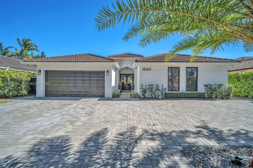 This beautiful property has been substantially renovated and very well kept. In 2019 the kitchen was fully remodeled, including cabinets, Calacatta quartz counters, and all kitchen appliances. In 2022 all windows and doors were replaced with impact glass and a 3 panel sliding door was added to the family room making entertaining outside a breeze! The primary bath was also completely updated in 2022. In 2024 both the front driveway and back patio were extended with slate gray pavers and a 10x12 pergola with with lighting and ceiling fans. In 2025 a 15' outdoor kitchen with Blackstone pro series 4 burner gas griddle was added. The exterior of the home is updated with smart/automated lighting including 21 soffit lights and 20 landscape spot lights. This is truly a move in ready home! Bring your tooth brush and start enjoying! Plenty room for a pool.