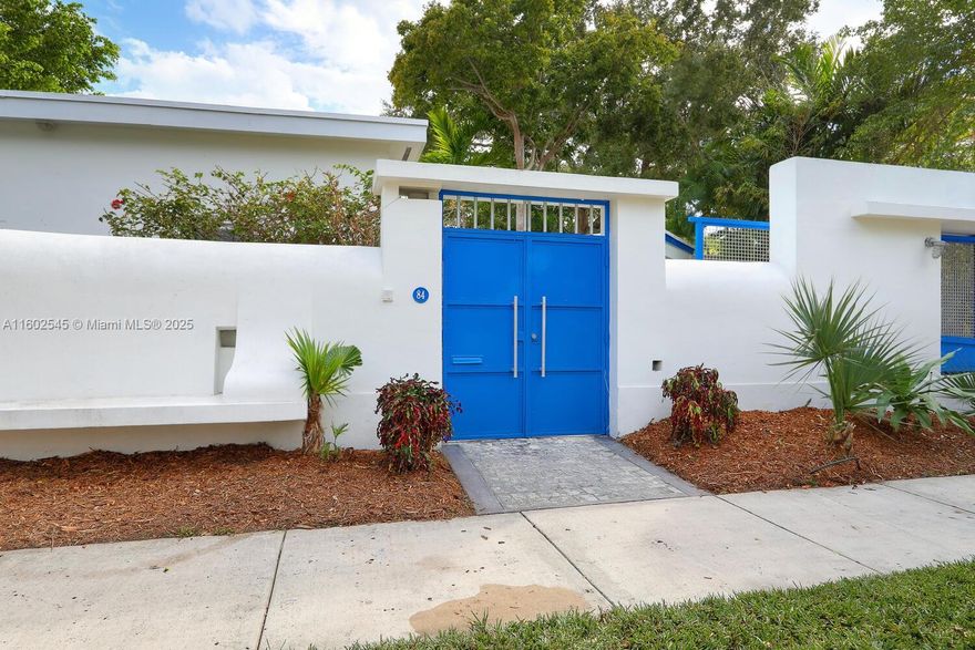Walled & gated  home in the exclusive Bay Heights neighborhood of Coconut Grove. 24/7 police patrol. Open living spaces with vaulted ceilings, hardwood flooring & French doors opening to the garden. Floorplan features  4BR/3BA and kitchen w/wood cabinetry, stone countertops & stainless appliances. Primary suite offers walk-in closet & marble bath w/ soaking tub & separate shower. Updates include: roof (2022), HVAC, water heaters, exterior painting & artificial turf. 600 SF 2 CG ( not attached ). Enjoy outdoor living and entertaining surrounding pool &​​‌​​​​‌​‌​​​‌‌​​​‌‌‌​​‌​​‌‌​​​​ spa.