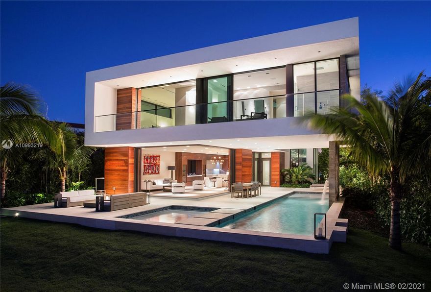 Tropical modern waterfront estate built in 2017 on Hibiscus Island in Miami Beach. Designed by award-winning Choeff Levy Fischman, it boasts 5 beds, 5.5 baths plus office all with wide water views. Lavish 4,395 sf with the finest finishes on a 9,187 sf lot. Stunning custom Italian kitchen, oak wood floors, smart home technology, floor-to-ceiling windows and a 2-car garage. Venture outdoors and uncover a resort-style backyard with 80 ft of water frontage, no luxury spared.