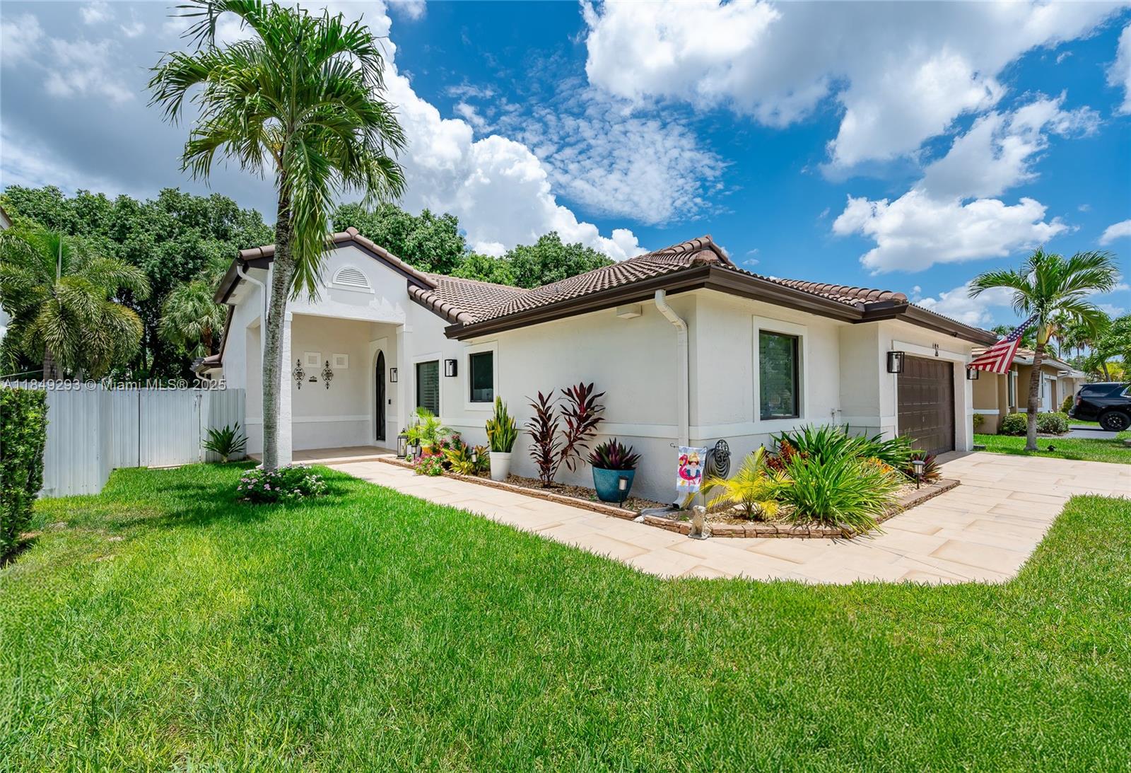 Gorgeous home! for rent Located in the desirable gated community of Pembroke Shores. This 3 bedroom/2 bath home boasts an open concept creating an airy & spacious atmosphere. Gourmet granite kitchen, large island with stools, White wood self-close cabinets, SS appl, induction glass stove top, dual oven/microwave/air-fryer combo. Waterproof flooring, impact windows/doors, plantation shutters & a 2 car garage. Bedrooms are generously sized, dual quartz vanity sink, custom glass shower doors, tankless WH, laundry room with sink, washer/dryer. Covered furnished patio is an entertainer's dream, Paradise Grill BBQ, granite Island w/Bluetooth surround system, fridge & lights. 24Hrs Gated Community, Easy access to major HWY, Turnpike, shops, restaurants & top-rated schools. You will fall in love!