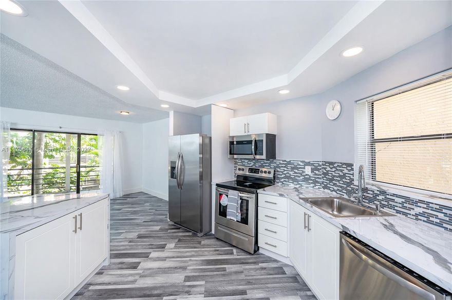 Looking to be the first owner of a newly remodeled 2/2? Look no further! This tastefully renovated unit features wood floors throughout, brand new appliances, kitchen island for entertaining, and a brand new AC. Washer and dryer are conveniently inside the unit. Screened in balcony provide desirable garden views. Low HOA includes a pool, gym, clubroom, game room, and elevator. Located in the heart of Plantation and in close proximity to major highways, schools, dining, shopping, and places of worship.*Check attachments for condo application & information, and pet information *