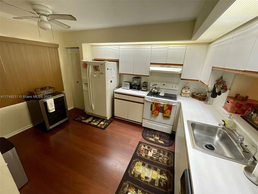Must-see! This immaculate, move-in-ready unit is located in one of South Florida’s most sought-after 55+ communities. Featuring stunning golf course views, beautiful flooring, textured walls, and a spacious master bedroom with a large closet, this home is designed for comfort. Enjoy the convenience of an in-unit washer/dryer, ceiling fans throughout, and a screened-in patio perfect for relaxation.
The community offers resort-style amenities, including a golf course, pickleball & tennis courts, pools, a fitness center, restaurants, a clubhouse theatre, and transportation services. The building features an elevator and a trash chute just steps from your door.