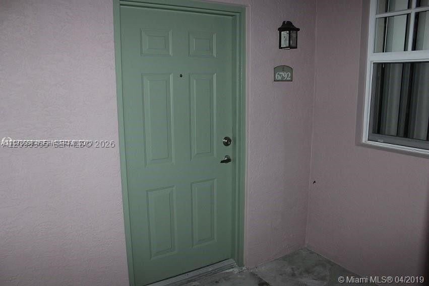 Photo of 6792 W Sample Rd #6792, Coral Springs, FL 33067 (MLS # A12093365)