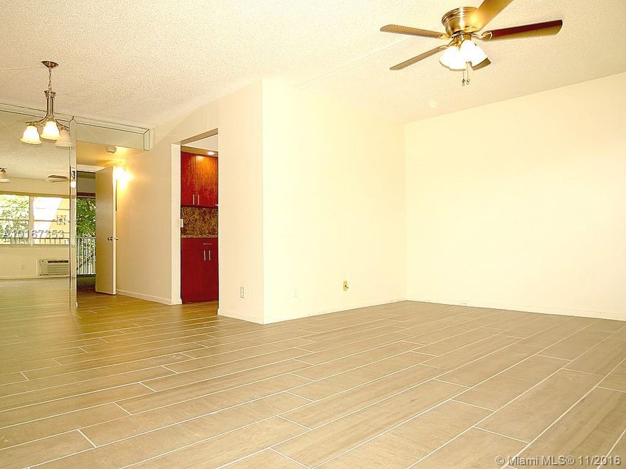 COMPLETELY UPDATED 1/1.5 unit at Century Village. Brand new kitchen and brand new wood-looking ceramic tile floors throughout as well as 3 new ceiling fans and chandelier. Clean and ready to move in!! Easy to show on LBX. 55+ community which offers resort style living!!