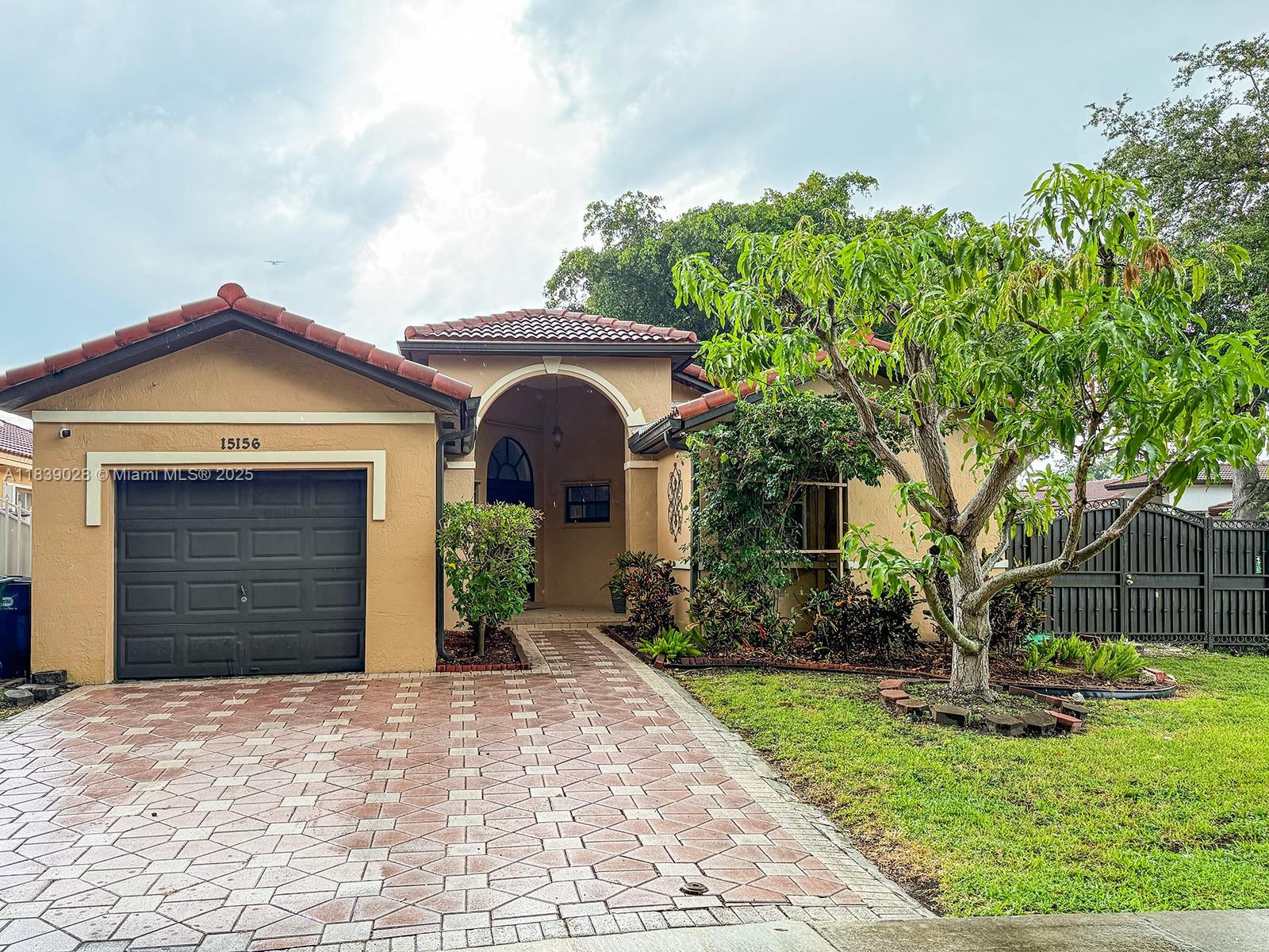 Beautiful 3-bedroom, 2-bath corner home with a one-car garage currently converted into a gym—easily converted back if desired. This freshly painted corner property features a fenced backyard with a pool, perfect for entertaining or relaxing. Enjoy an open and airy family room filled with natural light. Located in a desirable Miami Lakes neighborhood, this home offers comfort, convenience, and plenty of outdoor space.