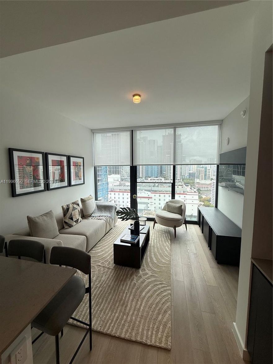 Experience elevated city living in this fully furnished, turnkey 1-bedroom residence at E11even Hotel & Residences. Residence 2909 features a smart, modern layout with impressive skyline views, designed for both comfort and flexibility. Ideal for end-users or investors, this unit is ready for immediate occupancy and perfectly suited for extended stays or income potential.
A rare private owner’s storage space is included, adding convenience and value rarely found in the building. Residents enjoy access to resort-style amenities including a luxury spa, signature dining, pool deck with cabanas, fitness and entertainment spaces, and exclusive beach club privileges.
Ideally located in the heart of Miami, just minutes from Kaseya Center, Adrienne Arsht Center, Wynwood, and the Design District, offering unmatched access to the city’s best entertainment, culture, and dining. A prime opportunity to own in one of Miami’s most dynamic lifestyle destinations.