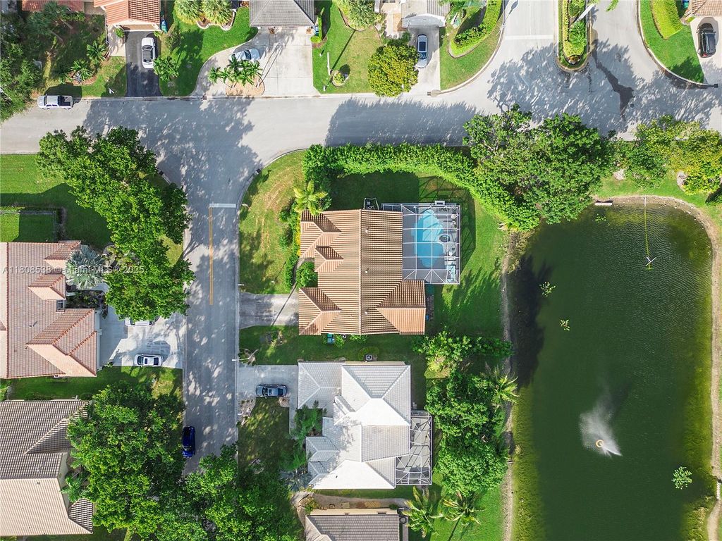 Photo of 9251 NW 42nd Ct, Coral Springs, FL 33065 (MLS # A11808538)