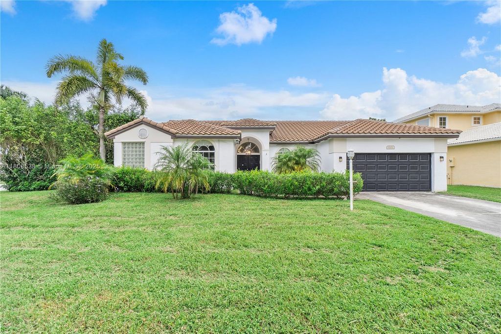Photo of 9251 NW 42nd Ct, Coral Springs, FL 33065 (MLS # A11808538)
