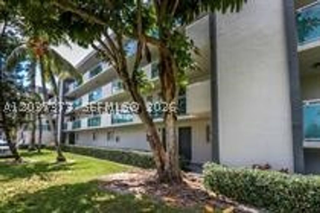 Photo of 8481 Springtree Dr #208B, Sunrise, FL 33351 (MLS # A12037373)
