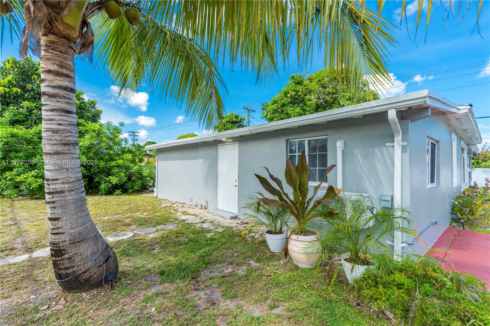 Welcome to this renovated, move-in ready studio in a gated home with private entrance and parking. Features include stainless steel appliances, split AC, updated kitchenette, and full bath. Utilities and landscaping are included for a hassle-free living experience. Ideally located on an oversized corner lot near Topgolf, Hard Rock Stadium, restaurants, shops, and public services. Easy access to the Turnpike and I-95 makes commuting a breeze. Enjoy comfort, privacy, and convenience in the heart of Miami Gardens.