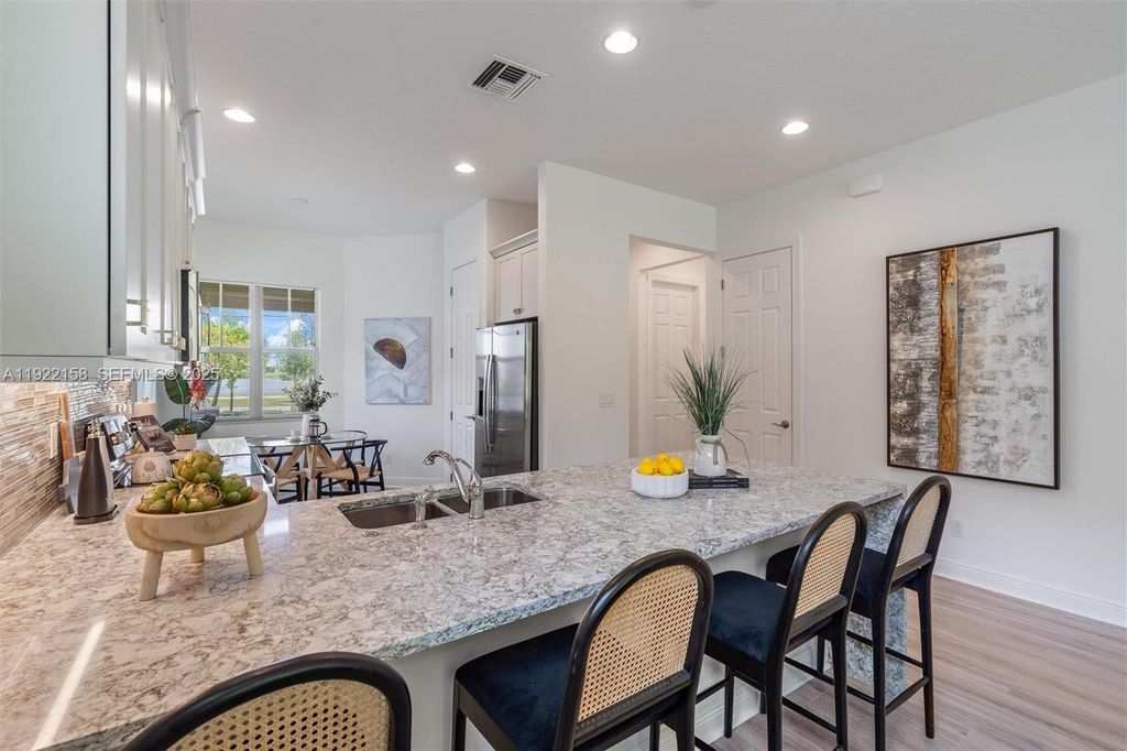 Photo of 11539 SW Visconti Way, Port St Lucie, FL 34986 (MLS # A11922158)