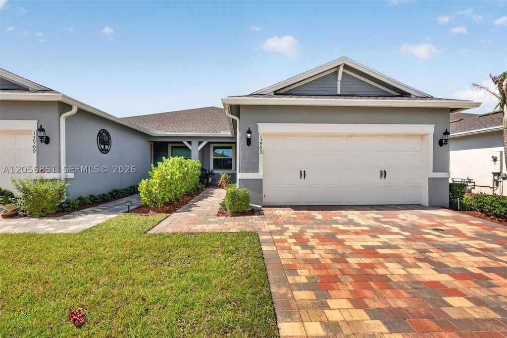Photo of 13903 SW Gingerline Dr, Port St Lucie, FL 34987 (MLS # A12056851)