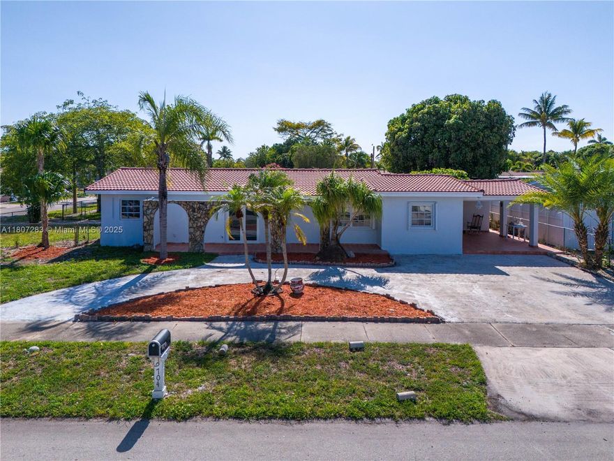 Value and location, Move-in ready corner lot with 4 bedrooms and 2 baths, plus in-law quarters with separate entrance. LOW property Taxes
The convenient side entrance offers secure and easy parking for those with RVs, boats, or Commercial vehicles. 

SELLER WILL CREDIT BUYER UP to $10,000 TOWARDS Title Policy with Seller's preferred closing agent. Location is key, and this home delivers with immediate access to both the Florida Turnpike and I-95
The green area provides the perfect canvas for a custom swimming pool, creating your private backyard retreat.