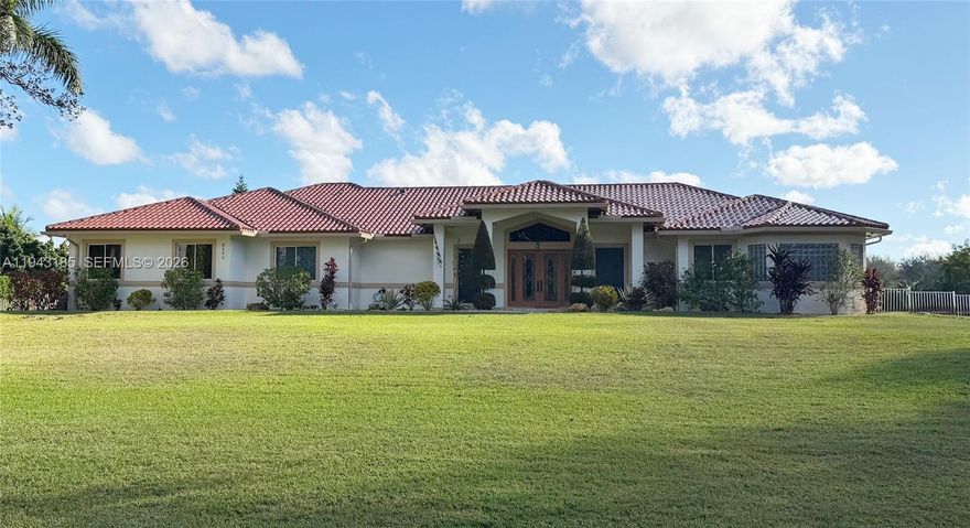 Equestrian community in Southwest Ranches! 2.03 acre property with large stable with 2 stalls, 2 storage rooms that can be easily be reconverted to stalls, and 2 feed/tack rooms. Home features spacious primary and bedrooms, guest/in law suite with full bathroom, office space, walk in pantry, playroom area among many other features. Perfect pool entertaining area.