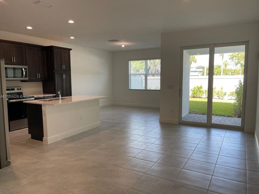 Beautiful 3BR/2.5BA townhouse for rent in sought-after Deerfield Beach. This spacious home features an open floor plan, modern kitchen with stainless steel appliances, quartz countertops, large living/dining area, and ample natural light. Upstairs offers generous bedrooms, walk-in closets, and elegant bathrooms. Two-car garage, laundry room, and private patio. Gated community with resort-style amenities including pool, gym, and clubhouse. Excellent location near beaches, shopping, dining, and major highways.