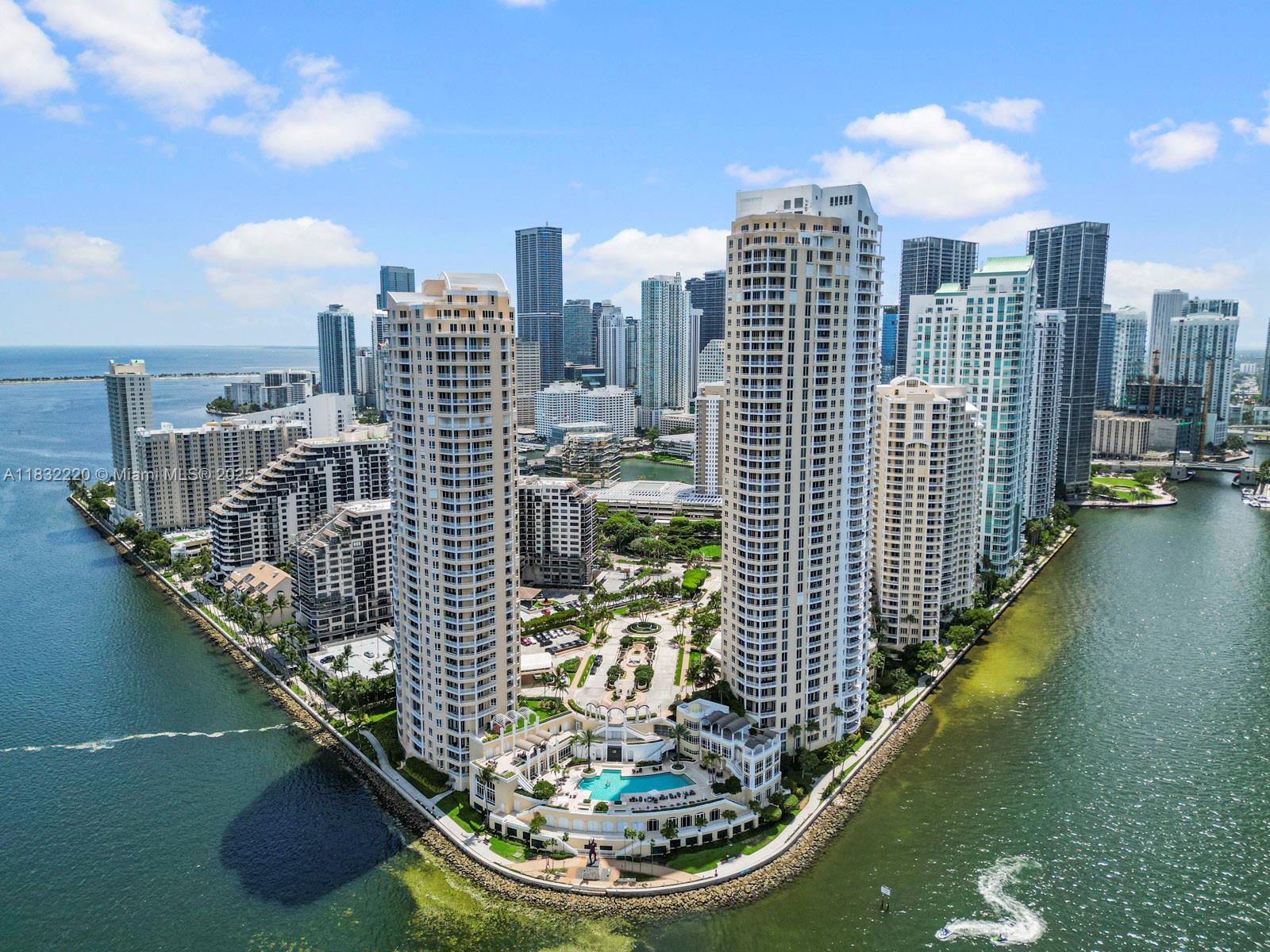 Brickell Key! Tequesta Two! Spectacular panoramic ocean & city views await you in this luxurious, high floor, corner, 2 bed/2.5 baths split floor plan residence. Fully renovated, Marble floors throughout. Technology enhanced state of the arts system controls A/C, Interior Lights, TVs & Window Treatments. Open kitchen with island bar ideal for great entertaining. This Designer Unit comes with with numerous upgrades, built-ins & TV’s. New A/C & Washer & Dryer. 1 assigned parking space & 1storage unit. Assessments are paid in full. Amenities include 24-Hour Security, Concierge, Valet Parking, Business Center, Bayfront Pool, Jacuzzi, BBQ area, 2-Story Gym, Basketball , Tennis Courts & Children's Play Area, 1.3 mile jogging/walking path along its paved perimeter with city & water views.