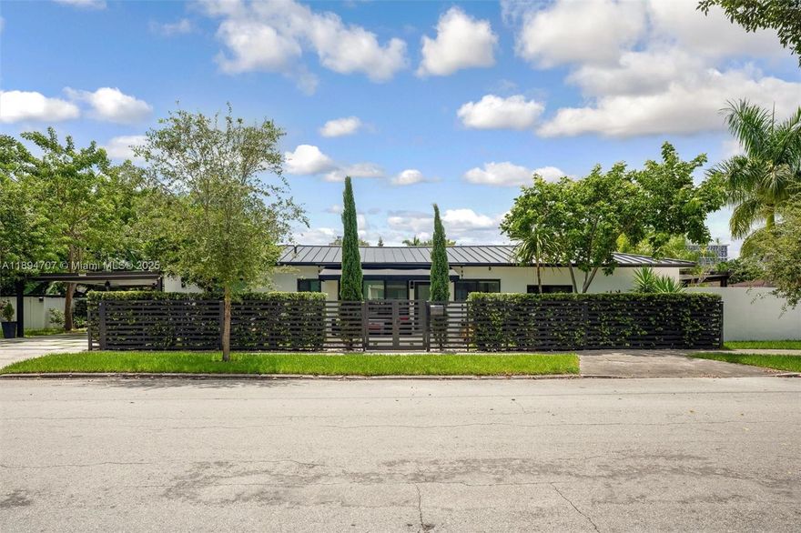 Stunning fully renovated 3BR/3BA plus master den home near all vibrant areas in Miami and featuring luxury finishes throughout! Enjoy security with automated fingerprint/combination entry doors, Ring alarm, and full video surveillance. Home upgrades include a new roof '24, new 5-ton A/C '25, impact windows/doors, a beautifully renovated kitchen \ top appliances. Spacious living room with built-in theater , elegant tile/stone finishes, and Toto washlet bath's with showers & jacuzzi tub. Master with den opens W \ private yard with a lux. pergola. Large carport, expansive side yard, 2 oversized storage areas, and gorgeous landscaping. 5 minute walk to upscale restaurants and iconic places in Coconut Grove SINGLE FAMILY! NO HOA \ income for buyer in place with a T3R zoning.