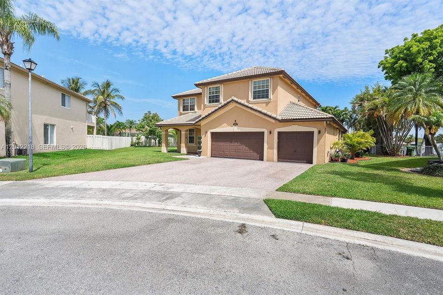 This rare listing is located in the highly sought-after Pembroke Shores, a master-planned and guard-gated community in the heart of Pembroke Pines. The home features five bedrooms and 3.5 bathrooms, including two master suites. The ground-floor master suite is ideal for in-laws, offering a cabana bathroom and direct access to the tropical heated pool and spa. The spacious primary master suite upstairs includes walk-in closets and a large flexible den that can serve as a sixth bedroom, nursery, office, or lounging area.
Situated in a large, quiet cul-de-sac, the home provides exceptional privacy with minimal traffic. Residents will enjoy stunning views of the pool and lake from nearly every room. Welcome to your private resort!!!