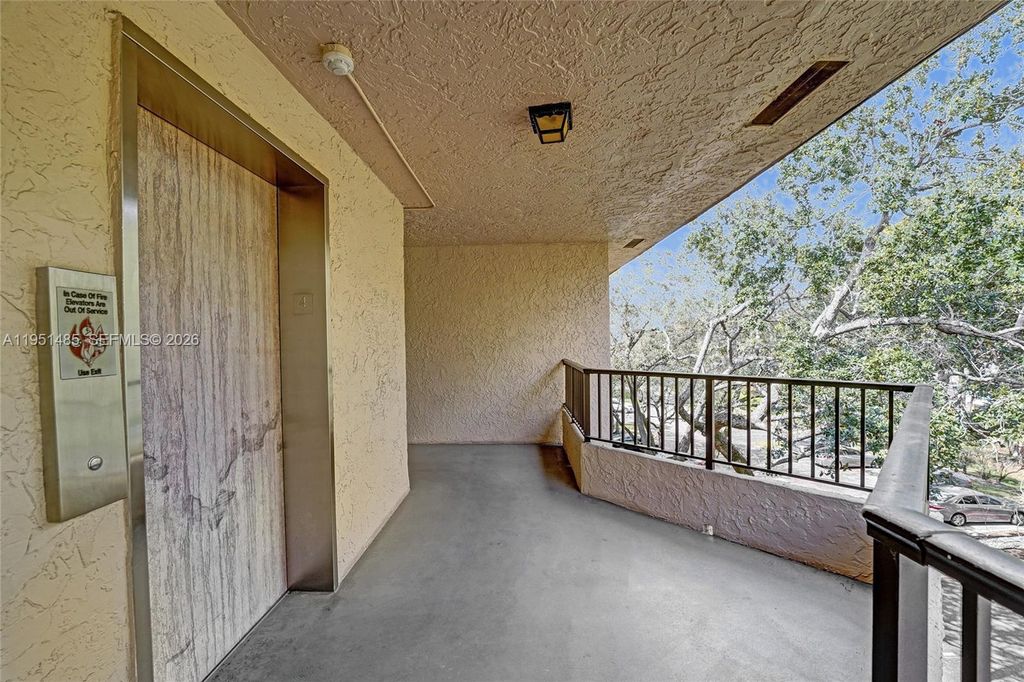 Photo of 10501 W Broward Blvd #406, Plantation, FL 33324 (MLS # A11951485)