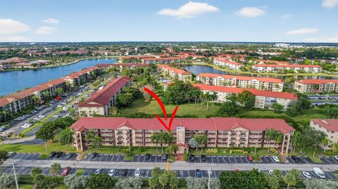 Photo of 13105 SW 16th Ct #407L, Pembroke Pines, FL 33027 (MLS # A11909435)
