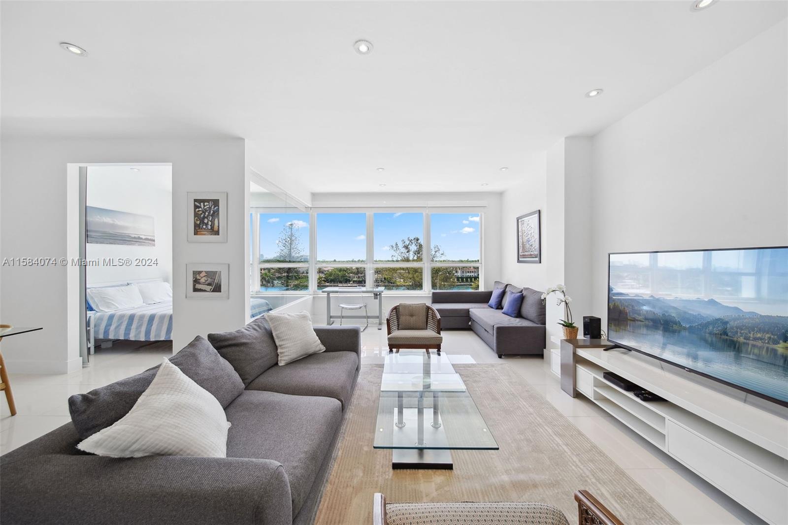 Step into coastal luxury in this fully furnished modern condo with spectacular views of the intracoastal and downtown Miami skyline. Features include tile floors, high ceilings, and an abundance of natural light, creating a serene and inviting ambiance. Residents can enjoy the convenience of a washer and dryer in the unit, as well as a host of resort-style amenities including a refreshing swimming pool and a state-of-the-art fitness center. This oceanfront property is nestled within a prime location on Collins Avenue with direct beach access. 24/7 secured lobby attendant and valet. This rental includes the following: basic cable, basic internet, electric, water, trash, and 1 parking space. Complete convenience for the future resident to enjoy the lifestyle of Miami Beach.