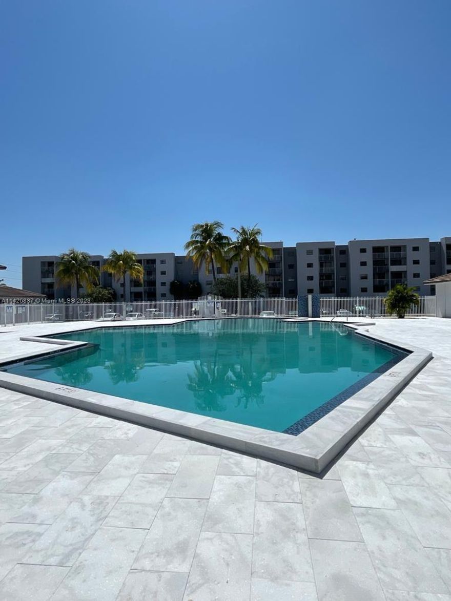 Location, Location, "Owner Occupant" or "Investor" 
Buy with as little as 5% down payment. The community has 10% Reserves.

"Corner Unit" with one assigned parking space, washer and dryer inside, 
3-year-old "Kitchen" with Granite Countertops and Appliances.

The property is located near FIU University, 5 minutes to Turnpike and the Palmetto Highway, and minutes to the "Airport", shopping centers, restaurants, and many work centers.

Association amenities POOL, GYM, Building Insurance, etc. only $360 a month.