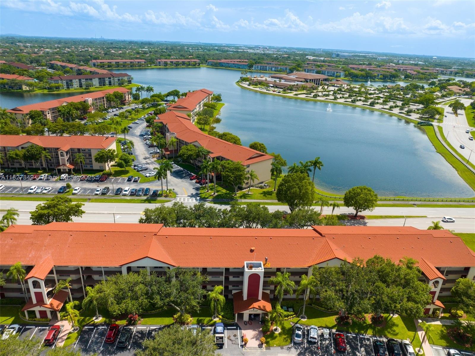 Welcome to resort stye living in Century Village! This 1 Bed/ 1.5 Bath condo has beautiful water views from the balcony, living room, kitchen and dining room! Tile flooring throughout and a washer and dryer in the condo. Includes one assigned parking spot and ample guest parking. Building very well maintained & new elevator. This unit can be rented upon sale, no waiting period. Enjoy resort-style amenities in this guard-gated 55+ community (occupants 18+ welcome): clubhouse, theater, pools, gyms, tennis & more. HOA includes cable, internet, and water. Reserves in place, no special assessments. Minimum credit score: 650+.