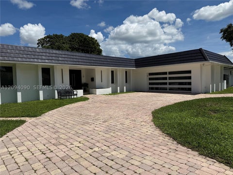 Photo of 2215 NE 204th St, Miami, FL 33180 (MLS # A12094090)