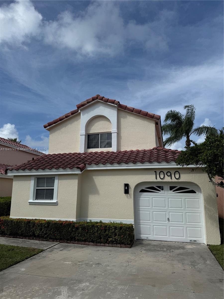 Beautiful lakefront turnkey hidden gem, within 1 mile from the beach in the sought for homes at Sheridan Ocean Club. A two story 3/2.5 home featuring an open floor plan with amazing lake views. You will find a large sized master suite with a master bathroom on the first floor. Two additional bedrooms with one full bathroom on the second floor. Bright kitchen with new stainless steel appliances, granite counter tops, and backsplash. Tile flooring throughout first floor and laminate on the second floor. Freshly painted exterior and interior. All tiled gorgeous bathrooms with new fixtures and lighting throughout the house. Stunning lake views from the screened paved patio ready for you to sit and relax. Just a short walk away you will find the community private island pool and picnic area.