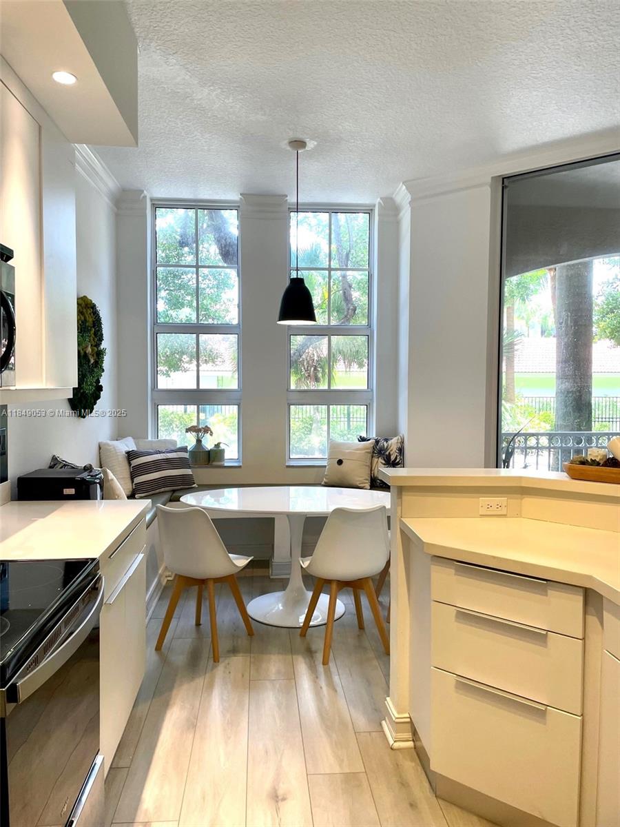 Ready to move in to one of a kind Unit in Alaqua. Completely furnished. Beautiful 2 Bed/2 Bath apartment at waterfront condo with garden views and Canal's private walkway. Kitchen remodeled with quartz counter tops and stainless-steel appliances. Open and spacious social area with 10-ft ceilings, with extensive impact windows from floor to ceiling casual and formal dining areas. Master Bedroom with two walking closets and private balcony. Large 2nd bedroom with walk-in closet. Full washer/dryer inside the unit. Alaqua has resort style amenities: Fitness center, pool, hot tub, private marina dock, social room, billiard room. Guard 24/7. Live in desirable Aventura, walking distance to the Mall, supermarket, restaurants, parks and A+ public schools/charter. 5’ to the Beach and highway.