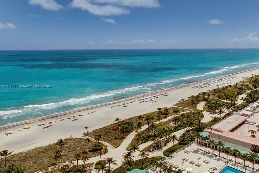 This magnificent direct ocean, highly desirable SE corner Penthouse is uniquely appointed to enjoy breathtaking direct Ocean views from all major rooms. Residence features; 4 generous terraces,  3 Beds, 4 Baths, Powder Room, Office, Pantry , Pilates Room & Staff Quarter. 3rd bed/convertible den. Grand foyer opens into an opulent living area w/coffered 10 ft ceilings, formal dining & custom onyx counter adjacent to open gourmet kitchen w/ gorgeous countertops, high end appliances & custom cabinetry. Elegant finishes throughout the apartment include venetian plaster, marble & wood floors, custom millwork. Massive Main Suite impresses w/ deep private terrace, 2 Baths, walk in closet galore & pilates room. Premier oceanfront building offers top-notch services & renowned private restaurant.