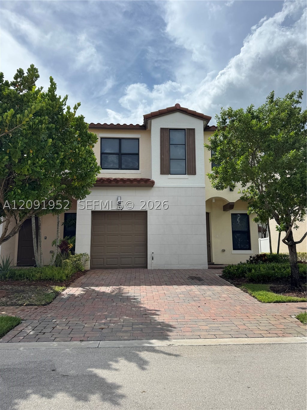 Photo of 130 NW 209th Trl #130, Pembroke Pines, FL 33029 (MLS # A12091952)