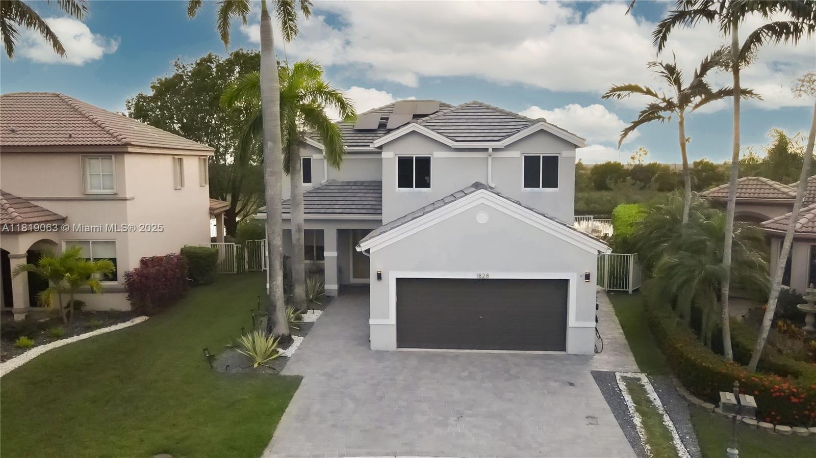 Property for Sale at 1828 Aspen Ln, Weston, Broward County, Florida - Bedrooms: 5 
Bathrooms: 5  - $1,875,000