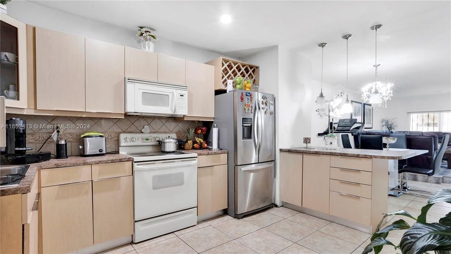 Remarkable Investment Opportunity in Hialeah!**
Don’t miss out on this beautifully remodeled 2-bedroom, 1-bathroom condo, a perfect gem for savvy investors. Offering a compelling 7.5% cap rate with potential rental income of $2,500 per month, this unit is primed for high returns. Step inside to discover elegant wood and tile flooring throughout, a contemporary kitchen featuring granite countertops, wood cabinetry, and stainless-steel appliances. Enjoy relaxing on your private balcony, accessible from the second-floor unit. For added convenience, washers and dryers are located on the same floor.