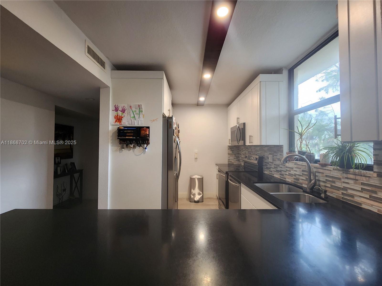 GREENGLADES CONDO IV - Residential Lease