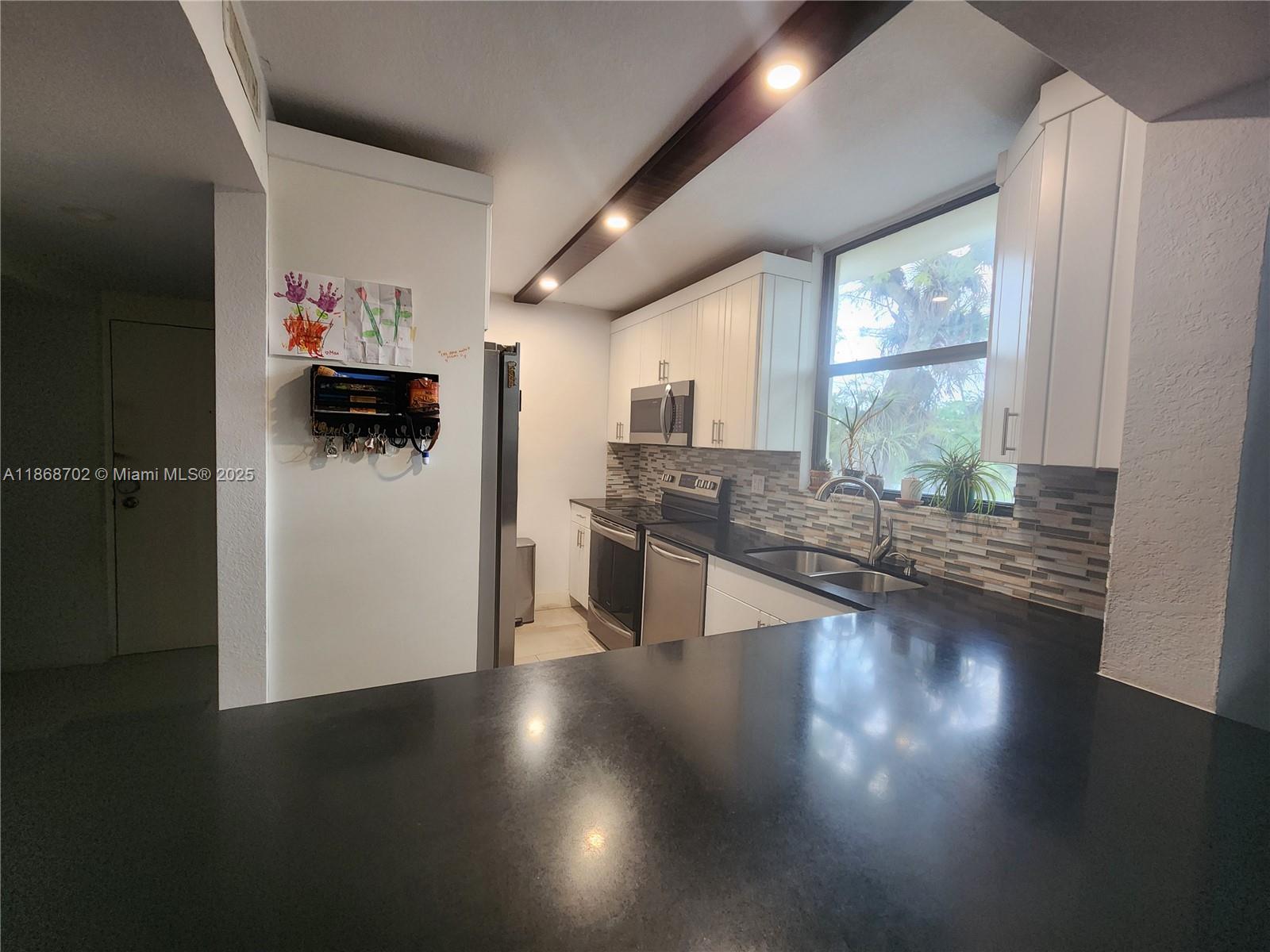 GREENGLADES CONDO IV - Residential Lease