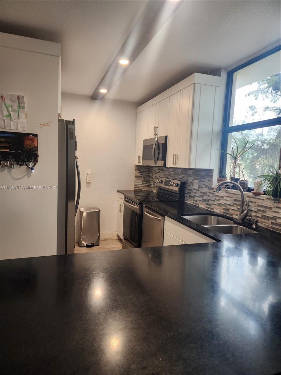 GREENGLADES CONDO IV - Residential Lease