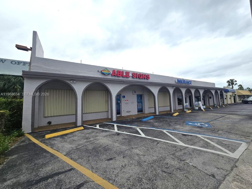 PRIME LOCATION: This 2,648 +/- SQFT storefront office/retail space is located on the corner of Atlantic Blvd and State Road 7 in Margate with annual average daily traffic of over 100,000 vehicles. Unit is perfectly set up as print and sign shop. This is a double unit which is flexible enough to be subdivided if needed. Current layout includes large open floor plan, 1 production room, 2 restrooms, and warehouse/storage area with one roll up door in the back. Large lot: 8,463 +/- SQFT. LPopular businesses in the area include Starbucks, Walmart, TD Bank, Chipotle, and much more. Space is also available for lease. Easy to show, lockbox on site. Call to schedule!